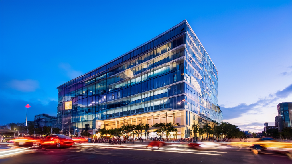 A bustling urban office building showcasing the collaboration between Kimi and Xiaohongshu, utilizing Twitter data analysis