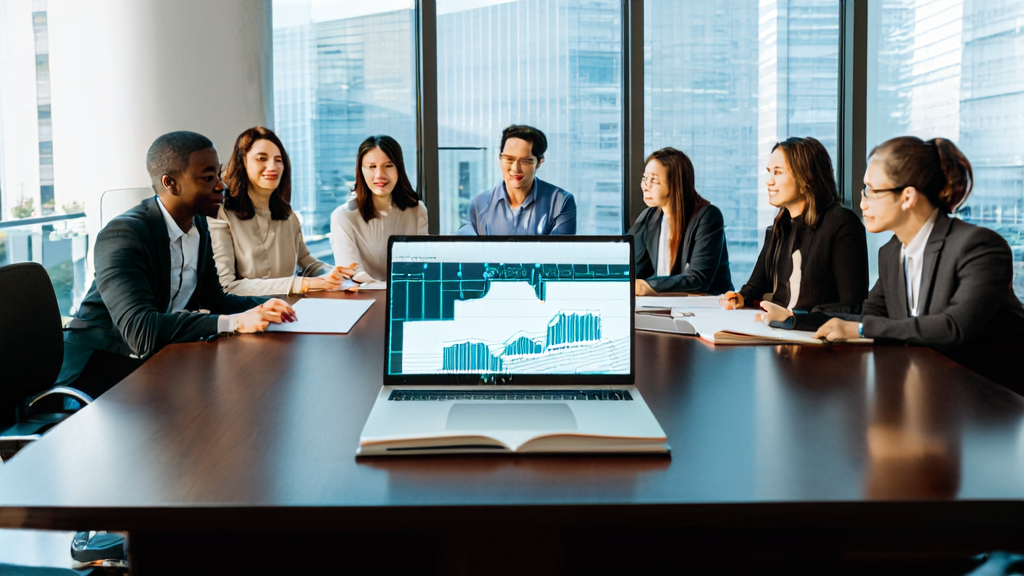 外贸企业员工围坐在一起讨论AI客户预测模型的应用，桌上放着一台显示数据分析结果的笔记本电脑和一本AI生成插图的字母书。